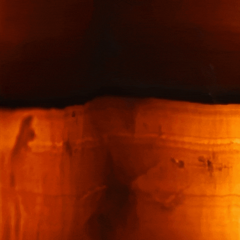 Australian red desert landscape with warm earth tones, inspired by natural minerals and the rugged beauty of Australia, evoking the essence of luxury niche perfumery